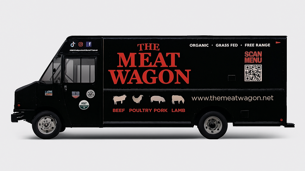 Black meat truck with 'The Meat Wagon' branding on a white background